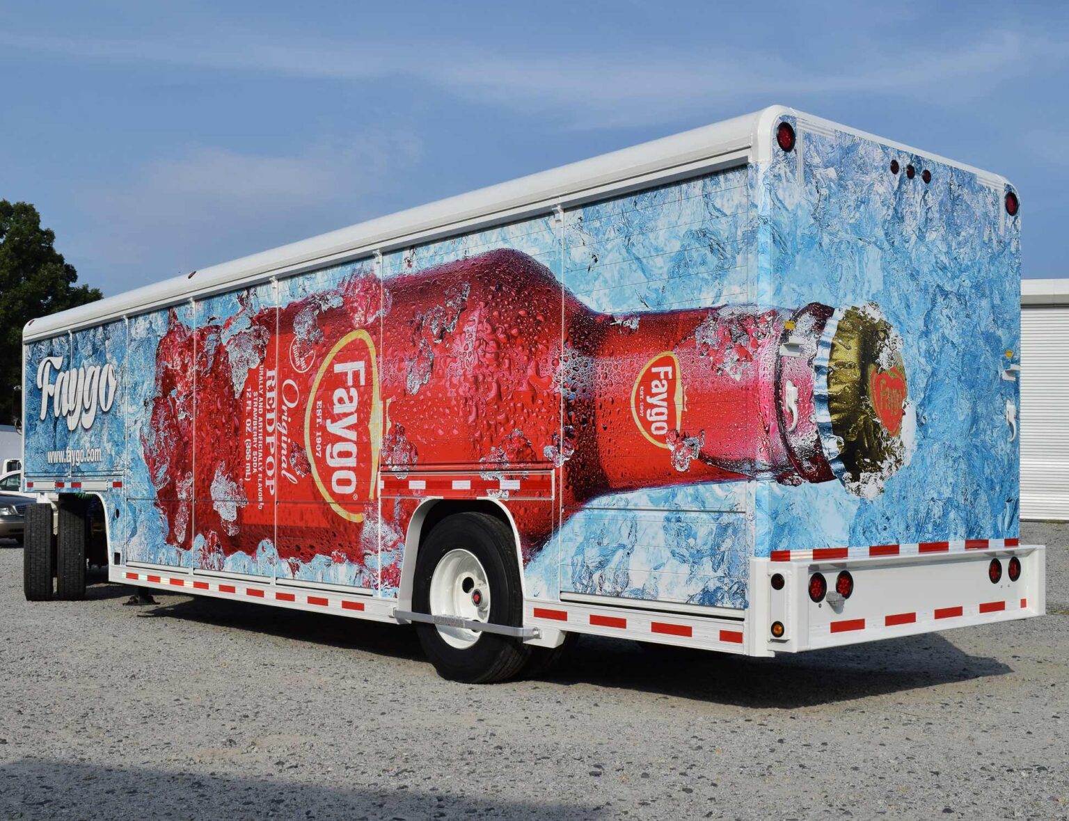 Beverage trailer that features optical illusion trailer wrap of Faygo beverage