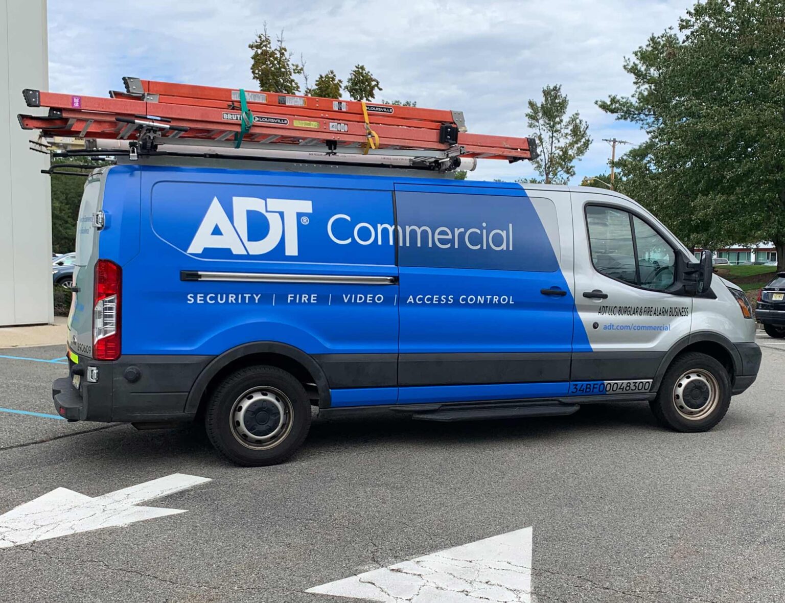 ADT Commercial van graphics on utility vehicle