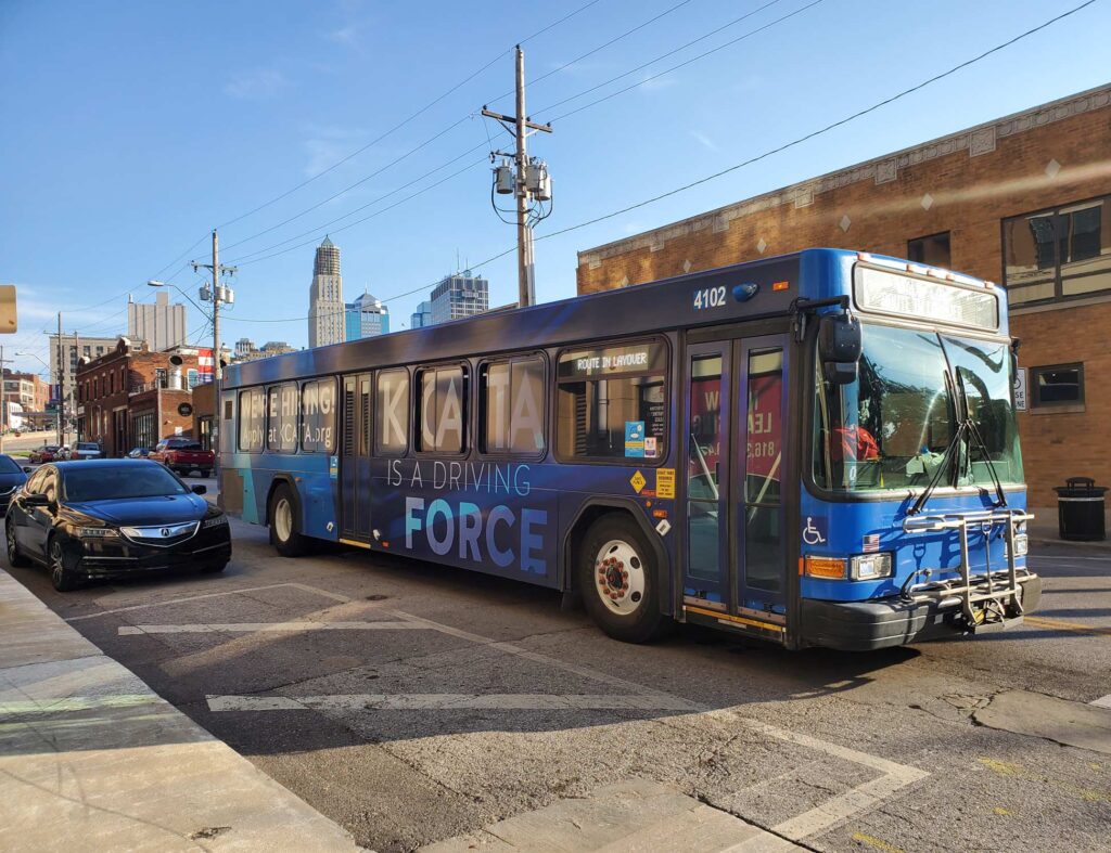 Kansas City bus wrap with window and body wrap covering all of bus