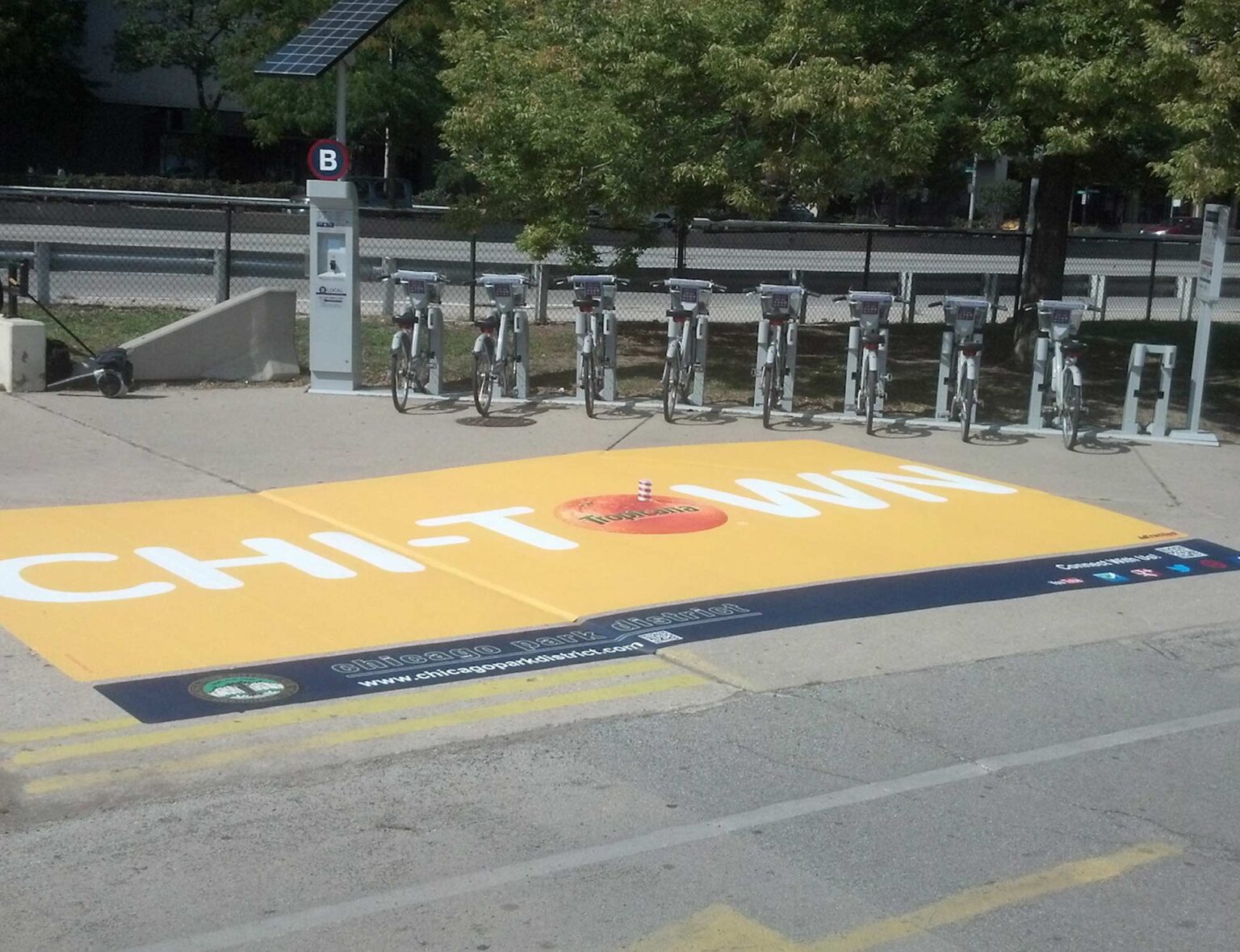 sidewalk graphic for Tropicana that is in a Chicago park